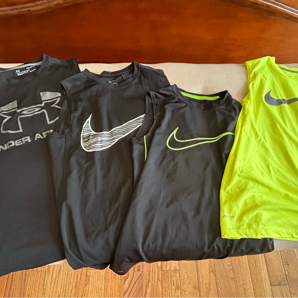 Nike tank tops and under armour boys tank tops. Make an offer
